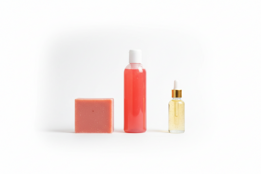 Yoni Bundle Showing All Three Products; Bar Soap, Shower Gel, And Oil Dropper Bottle On White Background