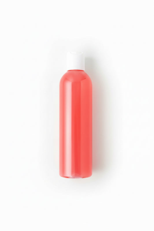 Yoni Shower Gel With Vibrant Coral-Colored Formula In Transparent Bottle